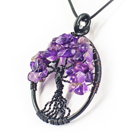 Close-up of wire-wrapped Tree of Life pendant with amethyst chips on black cord