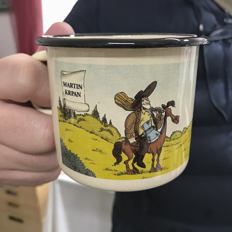 enamelled cup motive of Slovenian book character Martin Krpan.