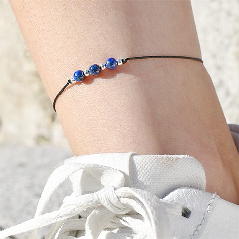 lapis lazuli kristal, nagležnica s kristalom, trgovina s kristali