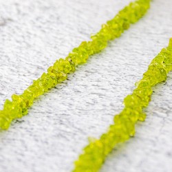 peridot, peridot kristal, peridot zapestnica, kristali za srečo, kristali za srčno čakro