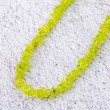 peridot, peridot kristal, peridot ogrlica, kristali za srečo, kristali za srčno čakro
