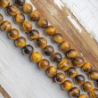 tiger's eye, tiger's eye crystal, crystal pearls, crystal beads, energy crystal, crystals for power